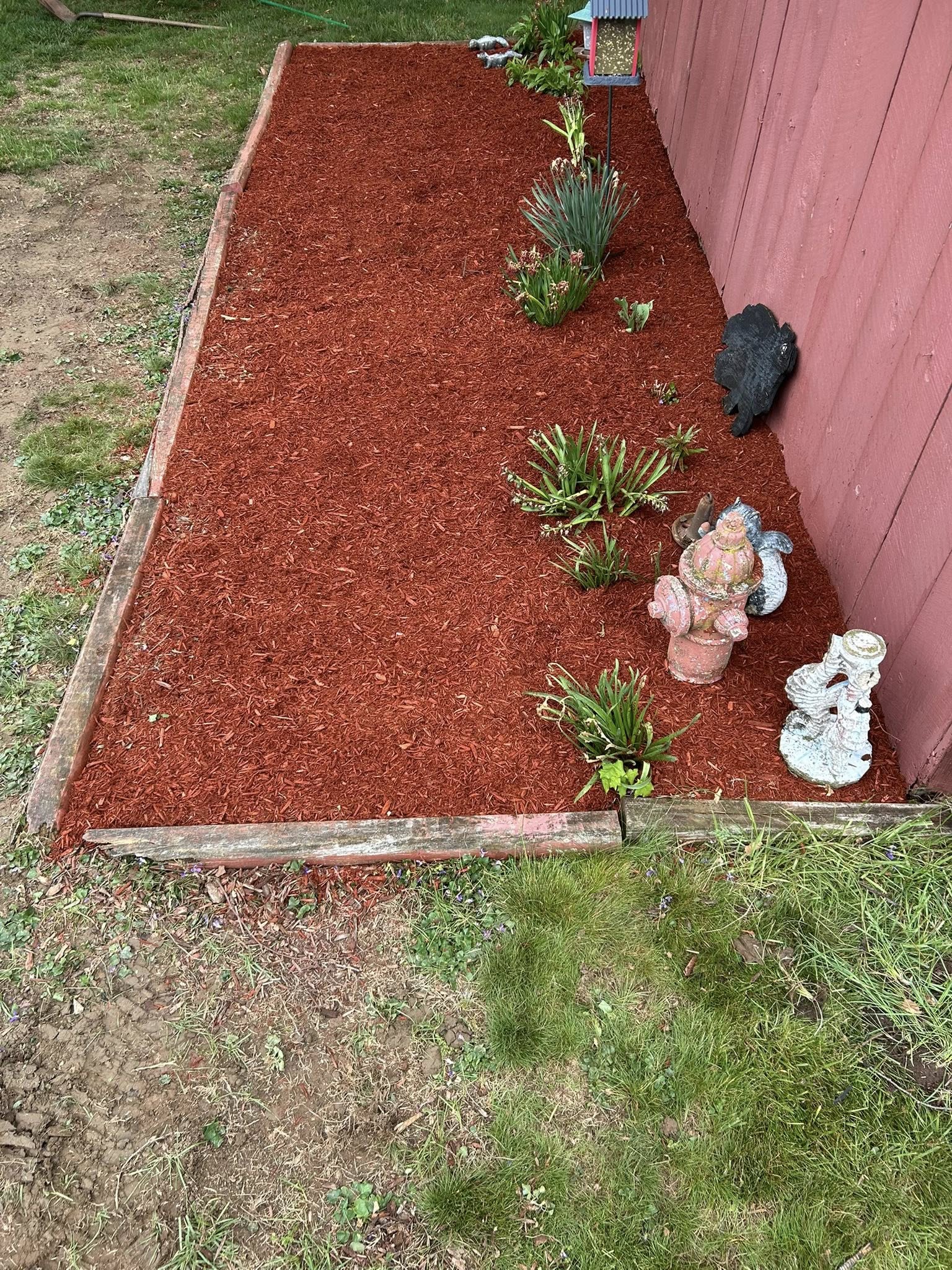 Fresh mulch installation by Lawn & Order Lawncare